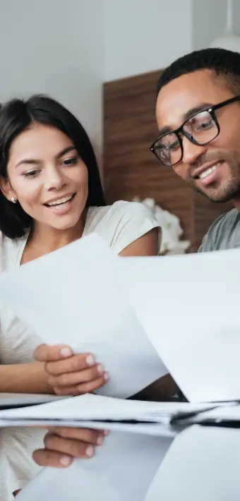 Image of a couple reading legal documents. | Keystone Law