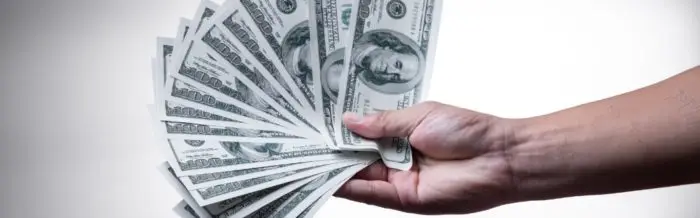 Image of person holding cash. | Keystone Law