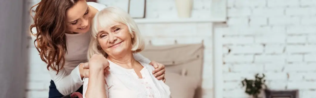 Image of a daughter embracing her mother smiling. | Keystone Law
