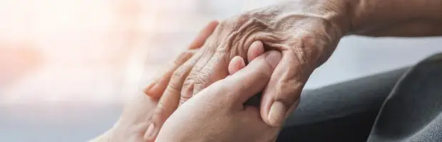 Image of two people holding hands. | Keystone Law
