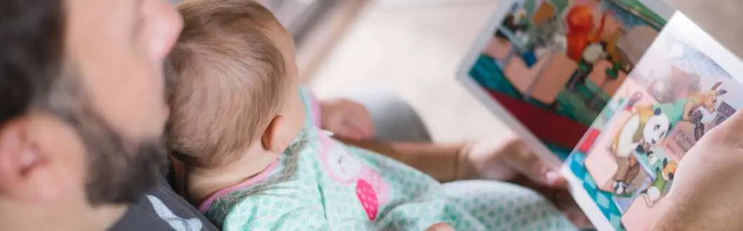 family reading on the couch