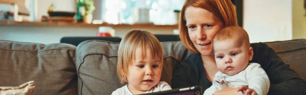 women sitting with children