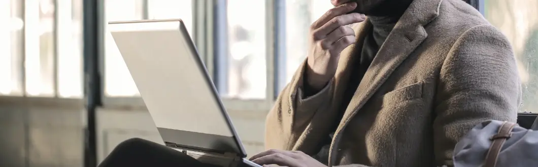 Image of an executor reading legal documents on his laptop. | Keystone Law