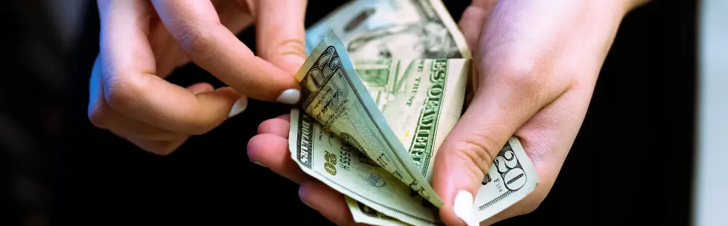 Image of a person counting cash. | Keystone Law