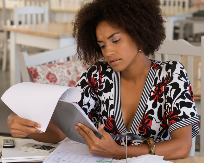 woman-reviewing-beneficiary-bank-statements