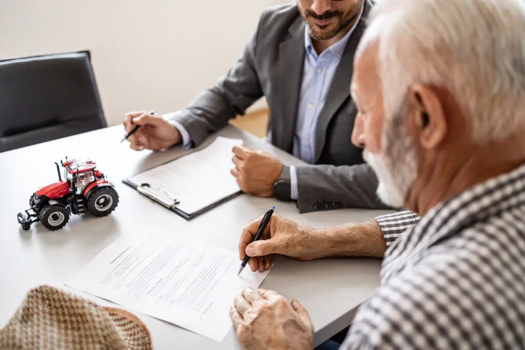 Signing contract and buying agricultural machines and farming equipment