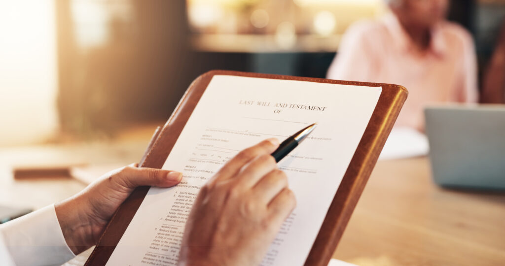 Hands, contract and person in office with lawyer for advice, planning or signature on death policy at law firm